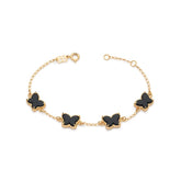 Pulsera mariposa chapada en oro de 18k con piedras sintéticas.